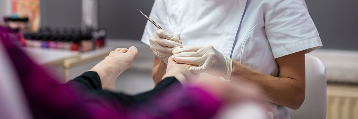 woman getting pedicure